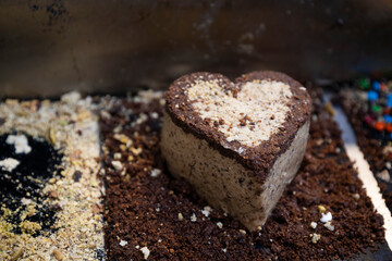 Different types of halva made from sunflower seeds and sorbet at the Eastern Jerusalem market. Sphere of heart