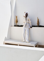 portrait of a black female model in stylish looks, street photography, national clothing.