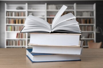Set of books on table in library, education concept