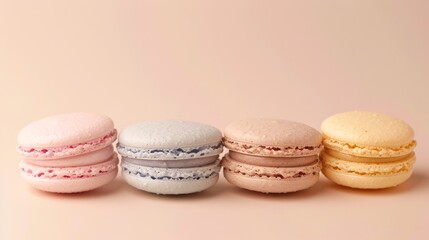 Obraz premium Assortment of Delicate Macarons in Pastel Colors on a Neutral Background