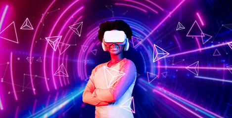 Girl looking around at geometric shape floating in metaverse. Happy teenager or gamer using VR headset and augmented reality technology accessing virtual world. Technology innovation. Ingenuity.