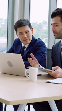 Job seeker in job interview meeting with manager and interviewer at corporate office. The young interviewee seeking for a professional career job opportunity . Human resources and recruitment concept.