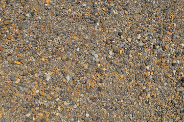Shapes, abstract texture patterns of coarse sand. Sand and gravel surfaces. Can be used for graphic design or banner background