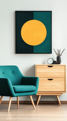 Teal armchair with a wood chest and a framed abstract art print with a yellow circle.