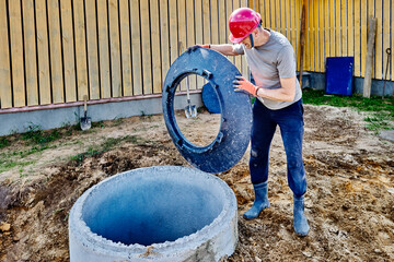 Septic tank made of concrete rings installation for discharge of wastewater.