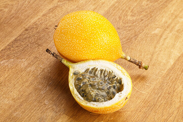 Yellow granadilla with cut half
