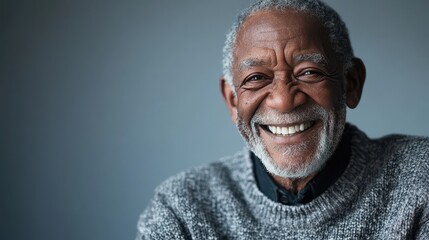 Joyful Man with Bright Smile Against Neutral Background
