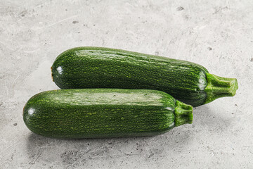 Raw green ripe zucchini vegetable