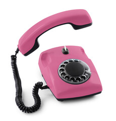 Old pink telephone with rotary dial isolated on white