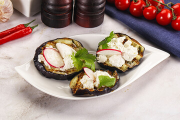 Grilled eggplant with cheese and radish