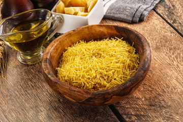 Raw dry Italian pasta Vermicelli