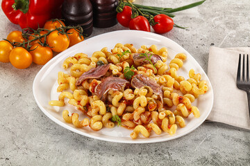 Italian pasta cellentani with anchovy