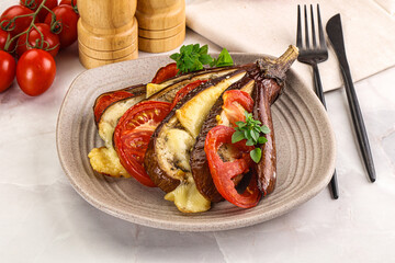 Baked tomato with mozzarella and tomato