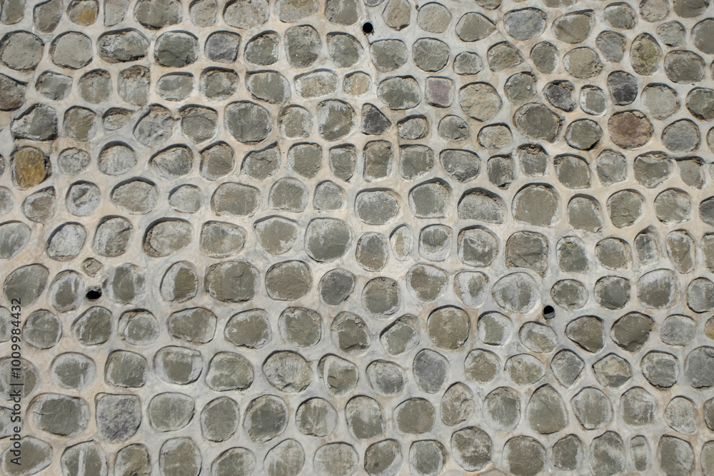 Aufkleber abstract shapes, patterns and textures of black stone walls arranged neatly. the shape of a round st