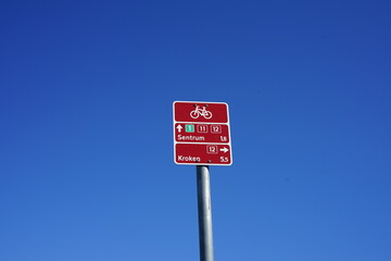Tromsøya, Romssasuolu, Tromsø Municipality, Troms, Norway - bike road 1, 11 and 12 direction signs to Sentrum and Kroken by bicycle to commute for locals tourists