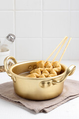 Odeng or Oden. Korean fish cakes.