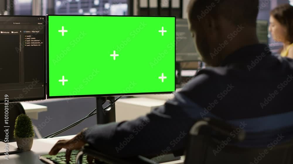 Poster man with disability in inclusive workplace working with machine learning tech on green screen comput