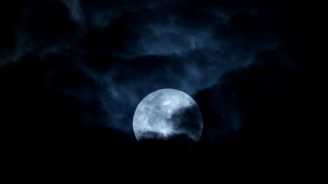 Fantastic moon in the flowing clouds. No.PLS50436-1. 4K, ProRES, 422, 10bit