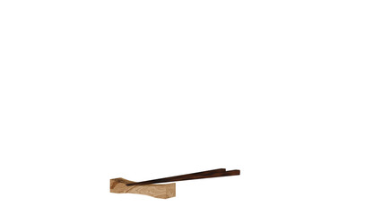 a pair of chopsticks sitting on top of a wooden block