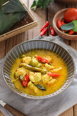 Ayam garang asem. Chicken sour and spicy curry. Javanese cuisine.
