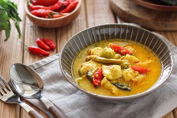 Ayam garang asem. Chicken sour and spicy curry. Javanese cuisine.