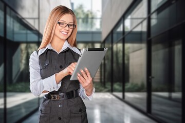 Fototapeta premium Happy business woman standing in business centers.