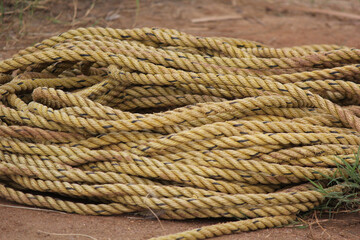 Fototapeta premium marine knot of thick brown rope