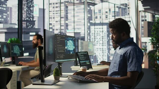 Manager coming to check on progress done by programmer creating AI machine learning models that can analyze data. Team leader supervising man doing artificial intelligence programming, camera B