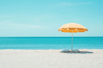 A yellow umbrella is on the beach next to the ocean, generative ai image