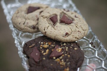 three cookies in a glass tray