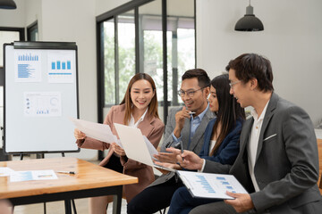 Business group meeting and giving presentations in the office