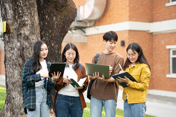 Students discussing work and doing homework in university