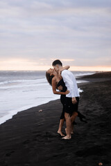 A Couple In Love, Husband And Wife, On The Beach Near The Ocean, Bali.