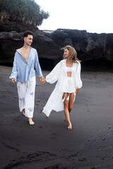 Fototapeta premium A Couple In Love, Husband And Wife, On The Beach Near The Ocean, Bali.