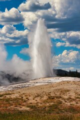Old Faithful Geyser in Upper Geyser Basin in Yellowstone National Park Wyoming.