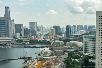 Naklejka premium Wallpaper Panoramic View Of The CIty Of Singapore Taken By The Panoramic Wheel In A Cloudy Day