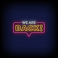 we are back neon sign vector with brick wall background