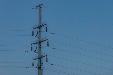 The Transmission line tower on blue sky