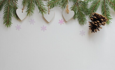christmas background with pine cones and branches