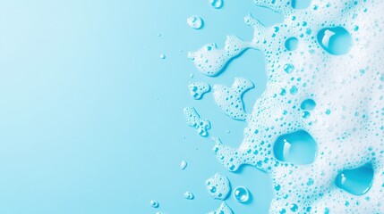 Border of bubble foam soap in blue water.