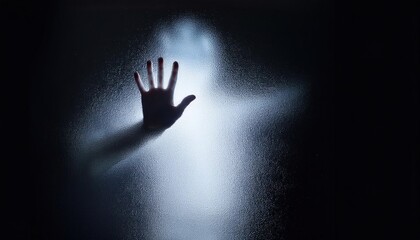 Dark shadowy ghost behind frosted glass with a hand pressed against the surface, featuring glow effects.