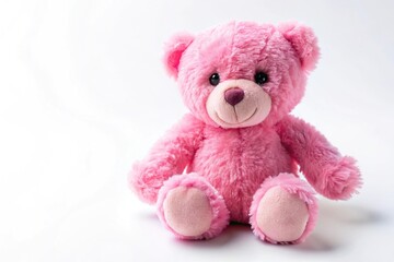 Extreme close-up of pink teddy bear doll on white background