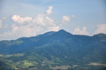 Naklejka premium clouds over the mountains views