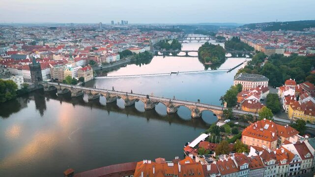 Aerial view of city Prague fly over river and bridge drone footage in 4k.