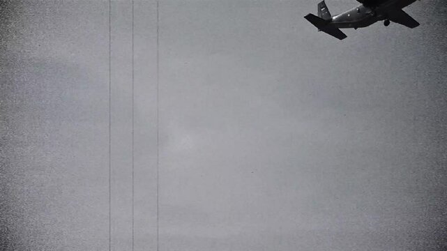 Low angel airplane with black and white and retro noise effects,classic airplane for history concept,vintage and retro style