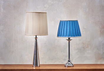 Vintage lamps on wooden board