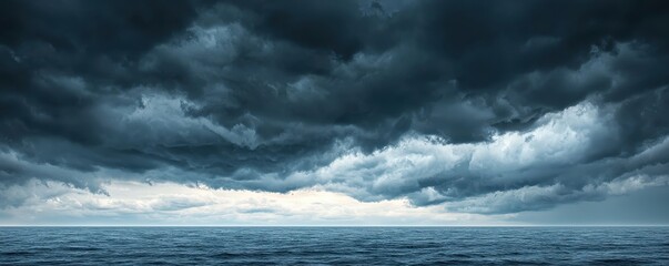 Fototapeta premium Dramatic ocean view with dark clouds and stormy sky, perfect for conveying mood and natural beauty in photography