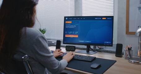 Adult woman enters prompt in artificial intelligence chatbot on personal computer. AI video...