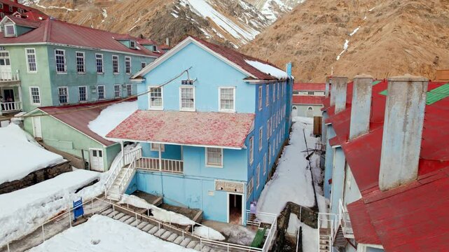 Drone fly details of historic colorful Palitroque Building at Sewell, Chile, Andean Cordillera UNESCO Altitude town