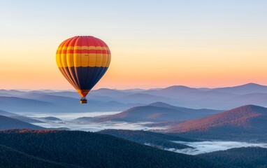 Fototapeta premium Hot air balloon floating over misty mountains at sunrise, peaceful sky, scenic adventure, serene travel experience